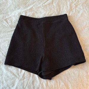Black comfortable and sexy going out shorts 
Never worn!